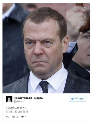 Путин и Медведев попали под дождь на церемонии в День памяти и скорби