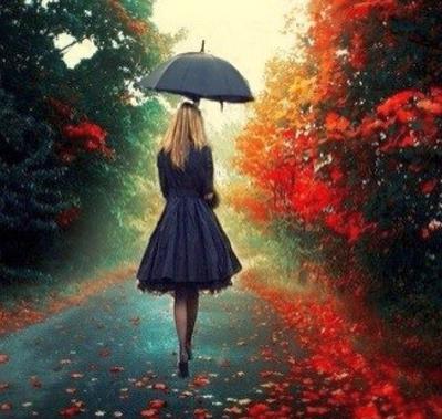 Женщина идет под зонтом со словом «свет». | Премиум Фото