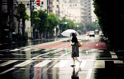 Люди под дождем / PhotoXPress