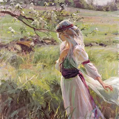 Фото Девушка в образе весны, с венком на голове, в платье из травы и  цветов, протянула руку к птице, парящей, в солнечных лучах